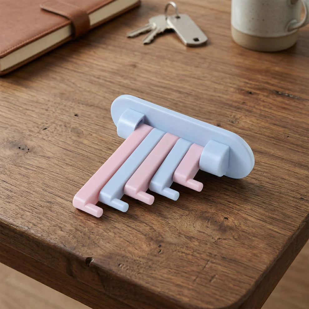 Wall-mounted, multi-arm folding hook rack