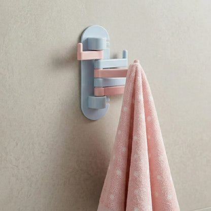 Wall-mounted, multi-arm folding hook rack
